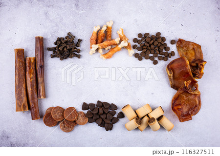 Assortment of different dog treats and snack 116327511
