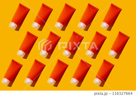 Sunscreen SPF sunblock cream on yellow background 116327664