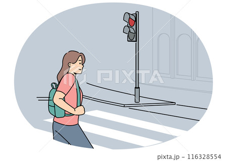 Woman pedestrian crosses road at red traffic light, putting own life and health car drivers at risk 116328554