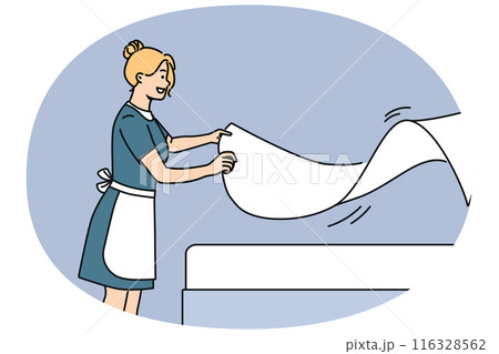 Woman maid makes bed with sheets, preparing hotel room for arrival of new guests 116328562