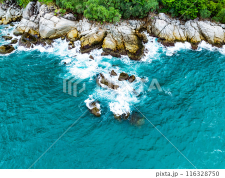 Amazing seascape view seashore and big waves crashing on rocks, Aerial view waves sea surface in Phuket island Thailand Amazing seascape view seashore and big waves crashing on rocks, Aerial view waves sea surface in Phuket island Thailand 116328750