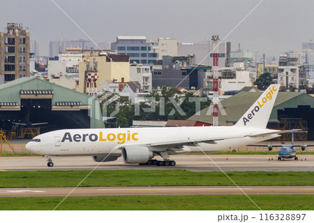 A Boeing 777-FZN Airplane Of AeroLogic Taxiing At Tan Son Nhat International Airport. 116328897