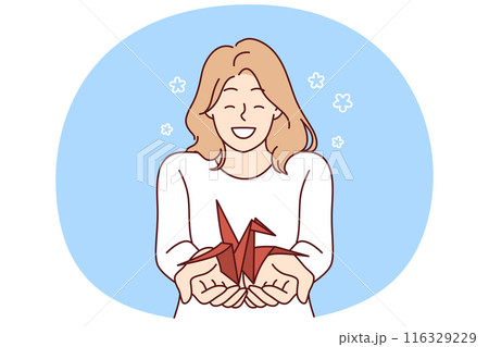 Woman with origami crane in palms wants to draw attention to problem of wildlife 116329229