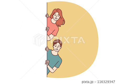 Happy man and woman with white banner peeking out recommending to pay attention to good offer Happy man and woman with white banner peeking out recommending to pay attention to good offer 116329347