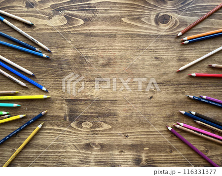 Background. Wooden table with multicolor pencils 116331377