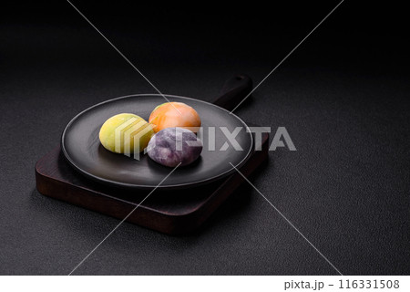 Delicious sweet chilled mochi desserts with fruit filling Delicious sweet chilled mochi desserts with fruit filling 116331508