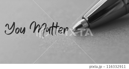 You matter text with closeup pen background in black and white 116332911