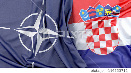 Croatian and North Atlantic Alliance (NATO) organization flags waving together. 3D Rendering 116333712
