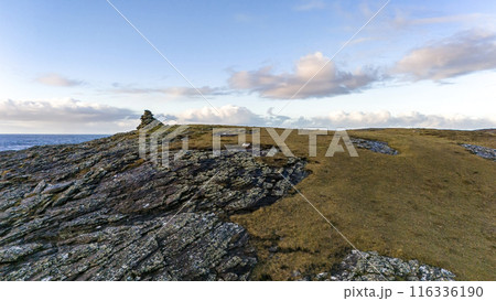 Aerial view a stone pillar at the beautiful coastline at Dawros in County Donegal - Ireland Aerial view a stone pillar at the beautiful coastline at Dawros in County Donegal - Ireland 116336190