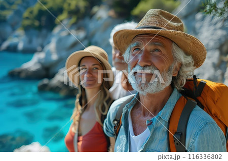 A group of elderly people during an excursion to the excavations of ancient ruins. 116336802