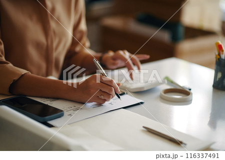 Woman Working With Logistic Documents 116337491