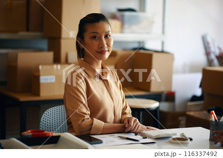 Warehouse Worker Sitting At Her Workplace 116337492