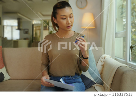 Woman Getting Credit Card From Bank Woman Getting Credit Card From Bank 116337513