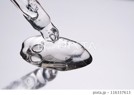Pipette with cosmetic gel or serum close-up. Pipette with cosmetic gel or serum close-up. 116337613
