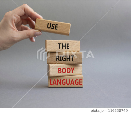 Use the right Body Language symbol. Concept words Use the right Body Language on wooden blocks. Businessman hand. Beautiful grey background. Business concept. Copy space Use the right Body Language symbol. Concept words Use the right Body Language on wooden blocks. Businessman hand. Beautiful grey background. Business concept. Copy space 116338749