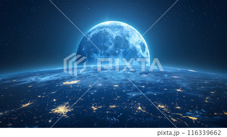 A blue planet emerges from behind another blue planet against a background of blue space 116339662