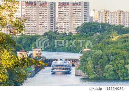 An old gateway on the Moscow river for adjusting the water level in the riverbed. An old gateway on the Moscow river for adjusting the water level in the riverbed. 116340864