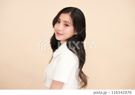 Beautiful young asian woman with clean fresh skin on beige background, Face care, Facial treatment, Cosmetology, beauty and spa, Asian women portrait. Beautiful young asian woman with clean fresh skin on beige background, Face care, Facial treatment, Cosmetology, beauty and spa, Asian women portrait. 116342876