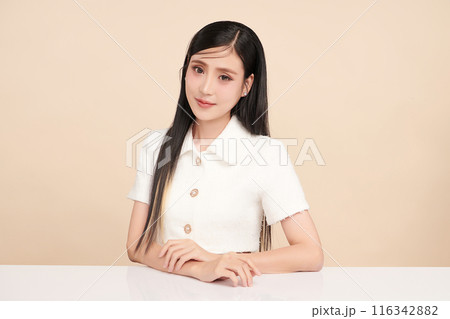 Beautiful young asian woman with clean fresh skin on beige background, Face care, Facial treatment, Cosmetology, beauty and spa, Asian women portrait. Beautiful young asian woman with clean fresh skin on beige background, Face care, Facial treatment, Cosmetology, beauty and spa, Asian women portrait. 116342882