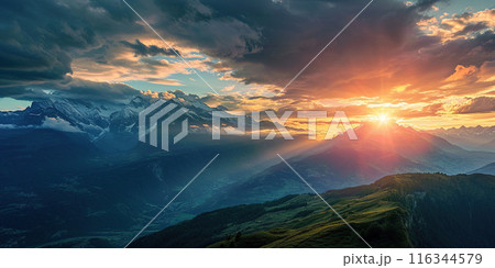 Swiss Alps snowy mountain range with valleys and meadows, countryside in Switzerland landscape. Golden hour majestic fiery sunset sky, travel destination wallpaper background 116344579