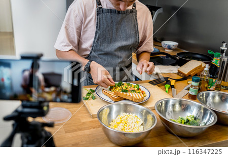 The chef is broadcasting live from workshop how to prepare a vegetarian food The chef is broadcasting live from workshop how to prepare a vegetarian food 116347225