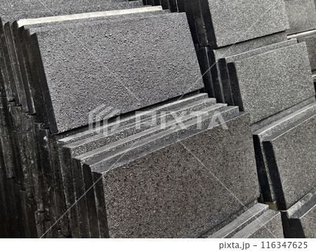 A collection of concrete tile is arranged on one another 116347625