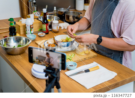 The chef is broadcasting live from workshop how to prepare a vegetarian food The chef is broadcasting live from workshop how to prepare a vegetarian food 116347727