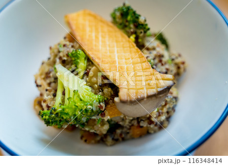 Healthy quinoa bowl with avocado, mushrooms and fresh vegetables Healthy quinoa bowl with avocado, mushrooms and fresh vegetables 116348414