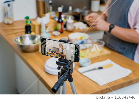The chef is broadcasting live from workshop how to prepare a vegetarian food The chef is broadcasting live from workshop how to prepare a vegetarian food 116348446