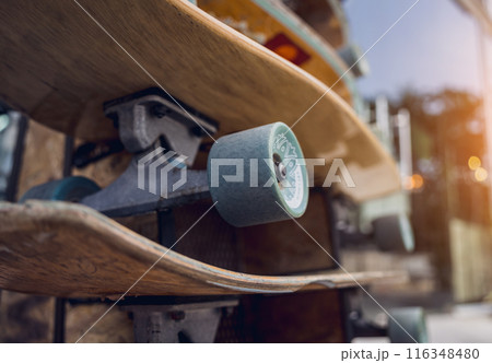 A stack of skateboards on a special outdoor stand A stack of skateboards on a special outdoor stand 116348480