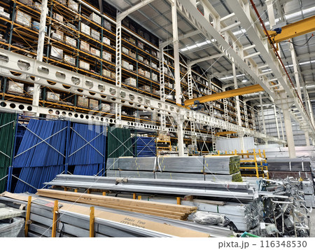 A big warehouse packed with numerous metallic nets and profile A big warehouse packed with numerous metallic nets and profile 116348530
