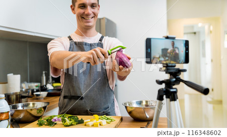 The chef is broadcasting live from workshop how to prepare a vegetarian green curry 116348602