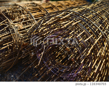 Metal bars arranged stack at the construction site Metal bars arranged stack at the construction site 116348703