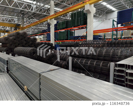 A big warehouse packed with numerous metallic nets and profile 116348736