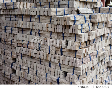Brick stack tied with ropes for construction and building purposes 116348805
