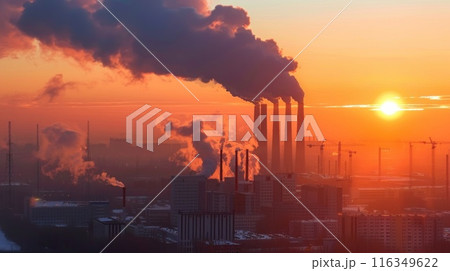 A large industrial plant is spewing smoke into the air A large industrial plant is spewing smoke into the air 116349622