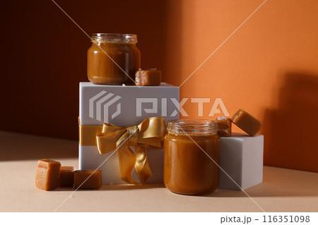 Salted caramel in a jar with a gift 116351098