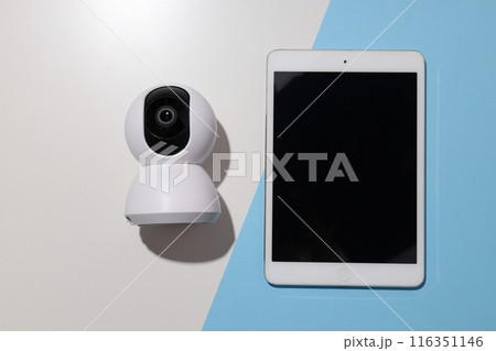 CCTV camera with a white tablet on the table 116351146