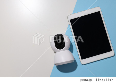 CCTV camera with a white tablet on the table 116351147