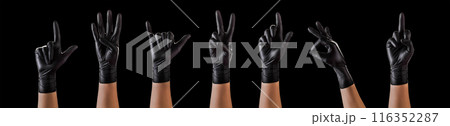 Hands in black gloves showing different gestures, pointing and showing signs Hands in black gloves showing different gestures, pointing and showing signs 116352287