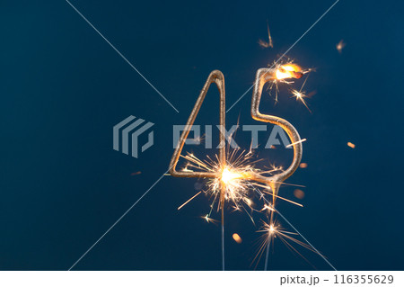 45 years celebration festive background made with Bengal fires in the form of number Forty-five. 116355629
