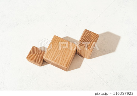 Product presenation mockup scene made with textured wooden shapes for your product placement. Studio photography. 116357922