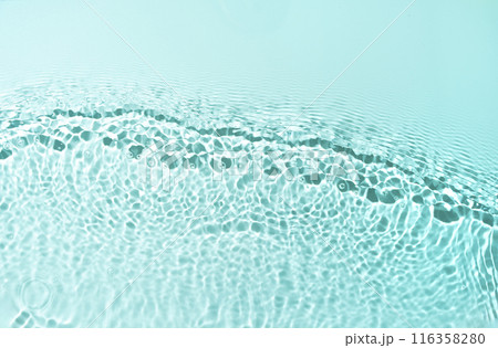 Water waves and splashes texture background. Perfect for design projects, backgrounds, and nature-inspired themes, this photo evokes a sense of freshness and calm. 116358280