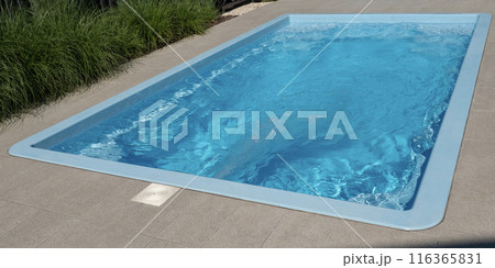 In the home pool, the counter-current system is turned on, making it an excellent place to swim in the backyard In the home pool, the counter-current system is turned on, making it an excellent place to swim in the backyard 116365831