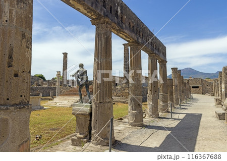 View of the historic ruined city of Pompeii in Italy with the volcano Vesuv View of the historic ruined city of Pompeii in Italy with the volcano Vesuv 116367688