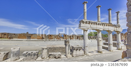 View of the historic ruined city of Pompeii in Italy with the volcano Vesuv View of the historic ruined city of Pompeii in Italy with the volcano Vesuv 116367690