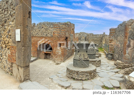 View of the historic ruined city of Pompeii in Italy with the volcano Vesuv 116367706