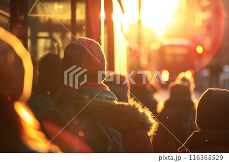 A crowd of people walking through the city on a sunny day at sunset. Hurry and lifestyle concept. blurred image 116368529