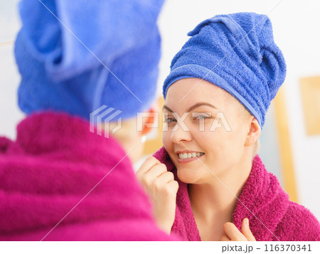 Woman in towel after shower Woman in towel after shower 116370341