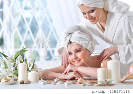 Beautiful woman in spa centar enjoying the massage. Beautiful woman in spa centar enjoying the massage. 116371118